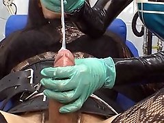 Zoe is helpless as her horny dominatrix punishes her monster cock with metal rods.