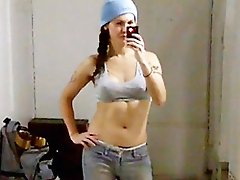 Naughty Nikki exposing her juicy cock in the toilet